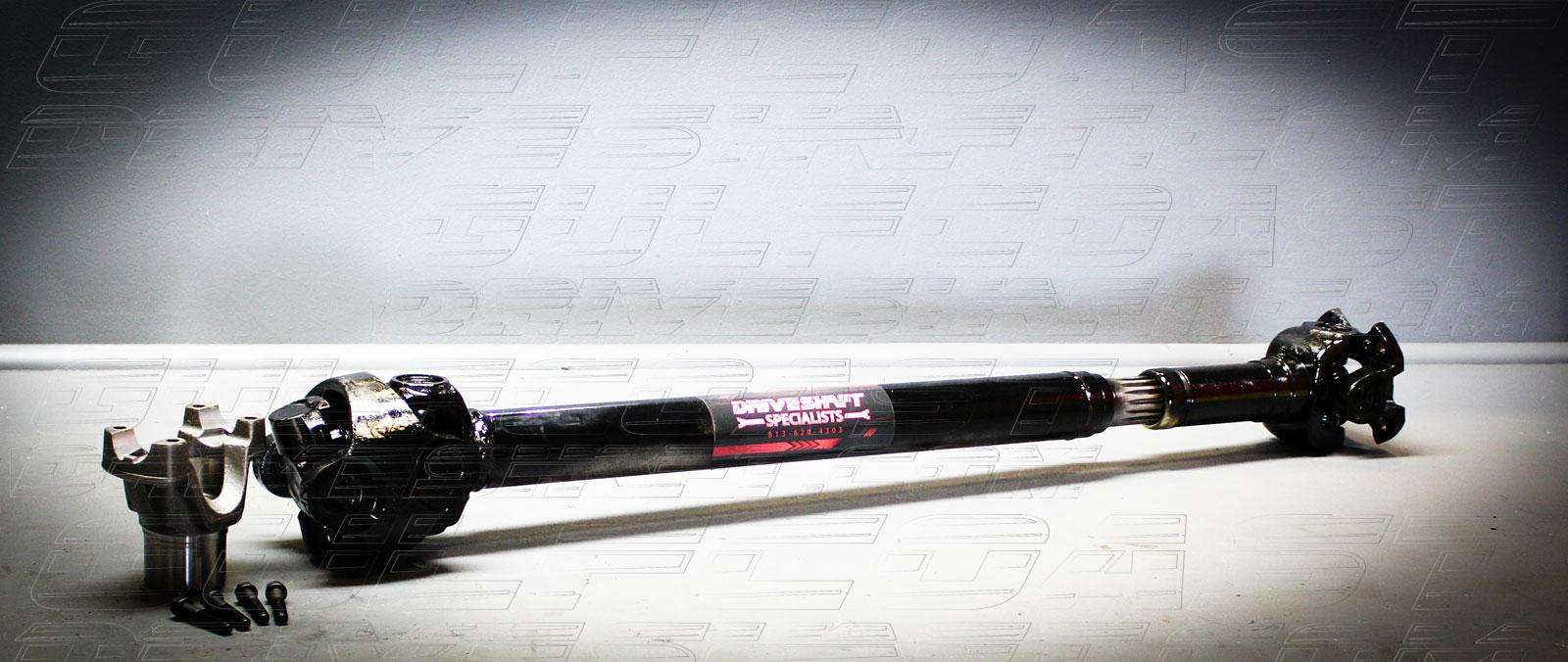 1350 Series Jeep JT Gladiator driveshaft combo in black and silver, featuring solid U-joints and hardware for enhanced durability.